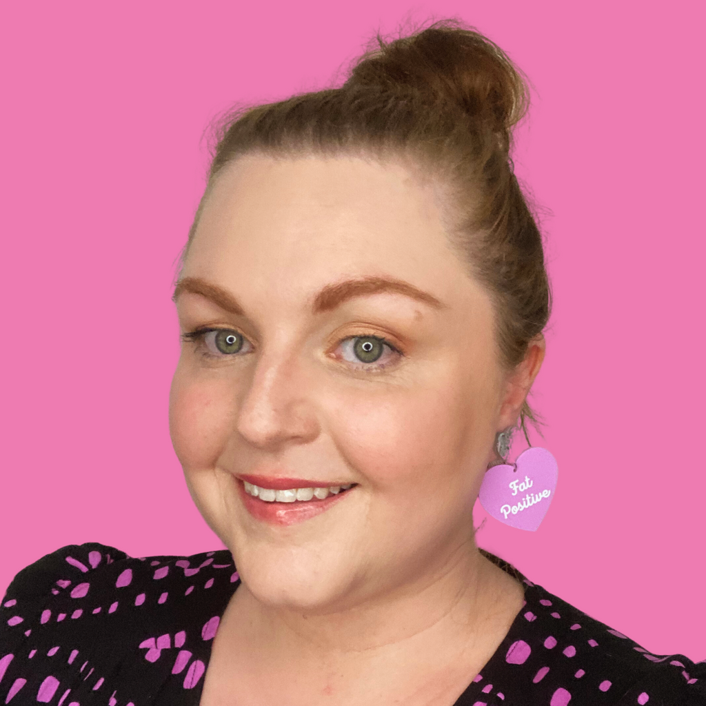 Laura wearing pink Fat Positive earrings